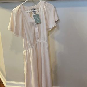 NEW WITH TAGS. H&M cream dress size medium